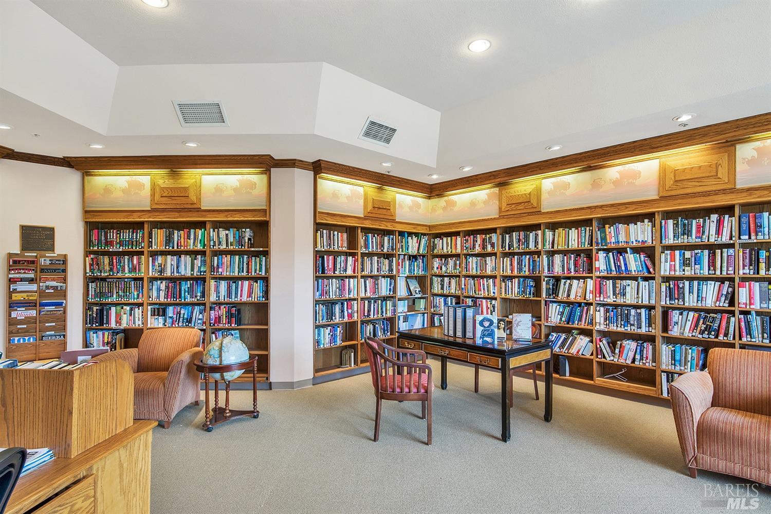 100 Thorndale Drive, Unit 303 San Rafael, CA 94903 - Photo 22 of 32 a reading room with furniture and book shelf