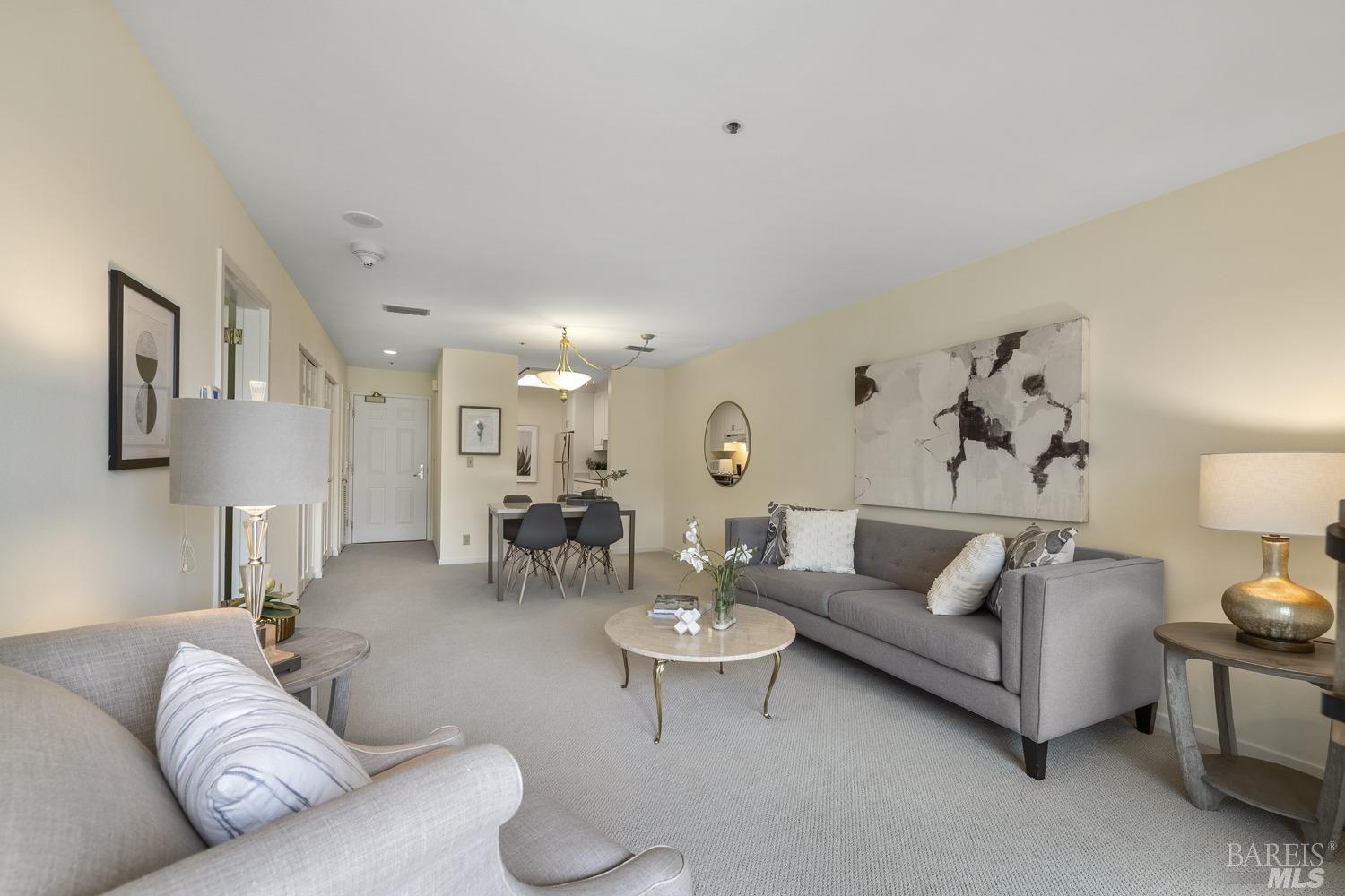 100 Thorndale Drive, Unit 303 San Rafael, CA 94903 - Photo 10 of 32 a living room with furniture and a couch
