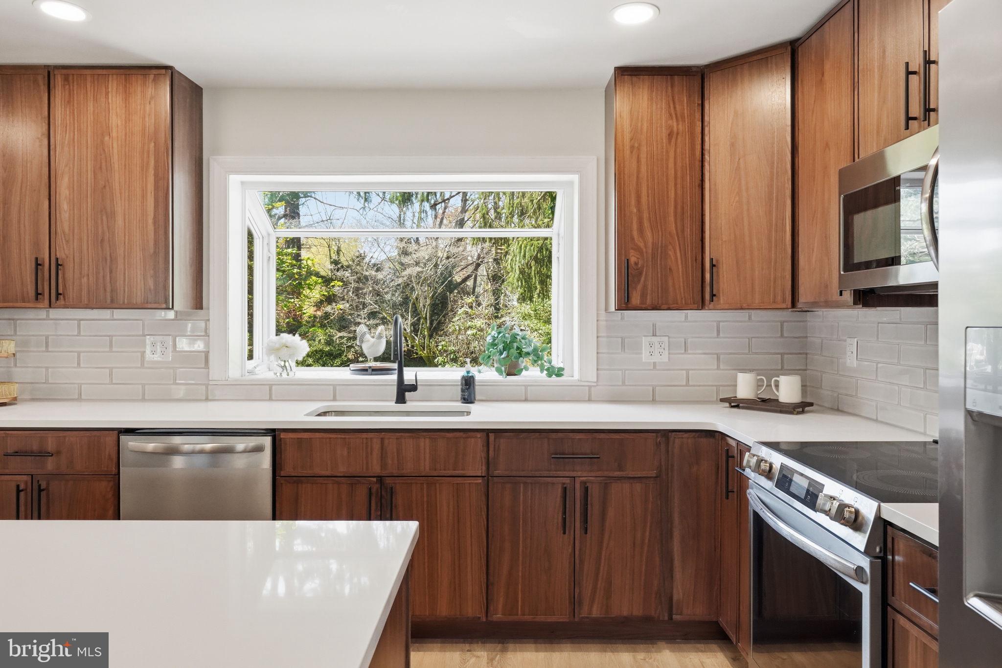 409 South Providence Road Wallingford, PA 19086 - Photo 34 of 106 Modern kitchen with serene views.