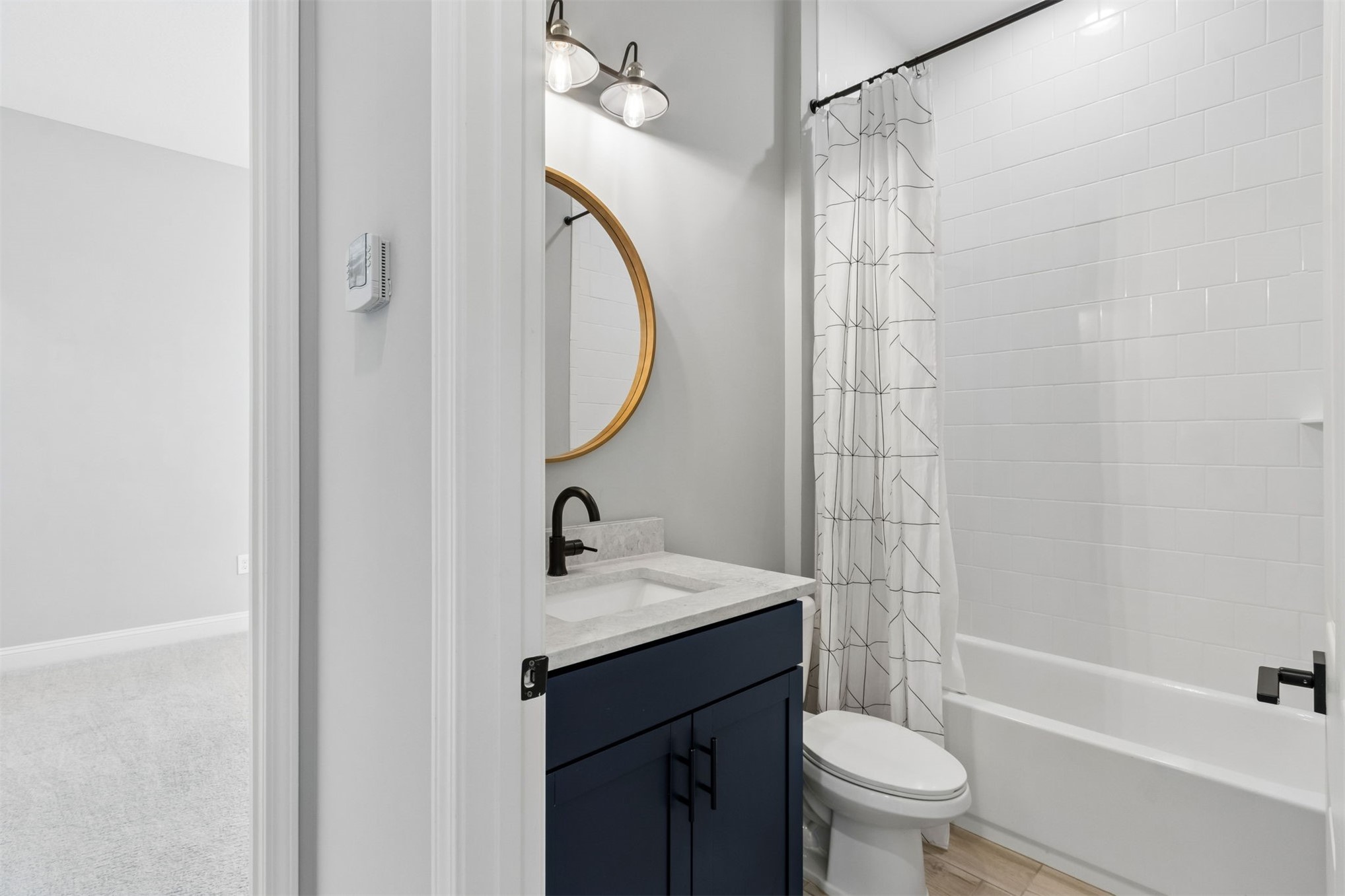 95169 Poplar Way Fernandina Beach, FL 32034 - Photo 11 of 25 a bathroom with a sink a toilet and shower