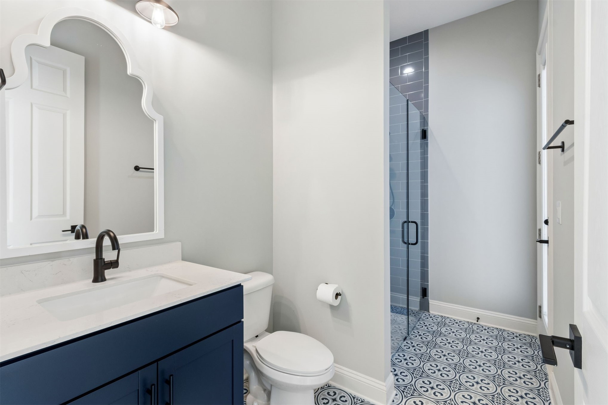 95169 Poplar Way Fernandina Beach, FL 32034 - Photo 14 of 25 a bathroom with a sink a toilet and shower