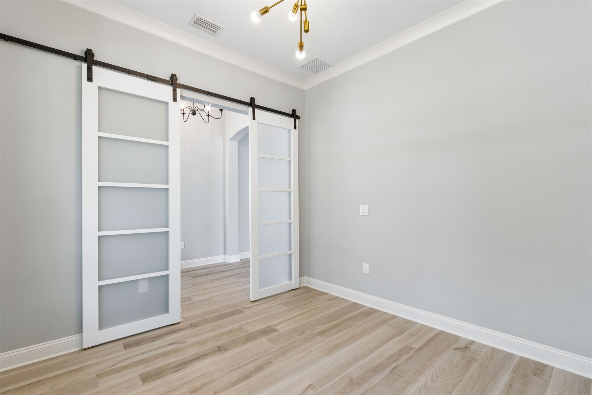 95169 Poplar Way Fernandina Beach, FL 32034 - Photo 2 of 25 a view of an empty walk in closet
