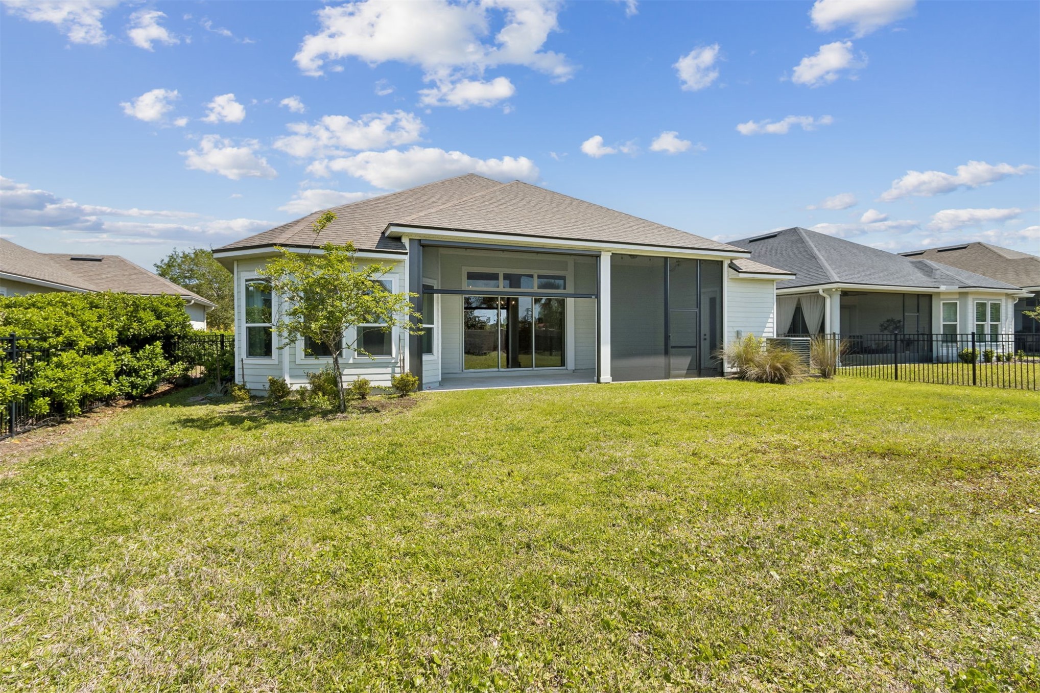 95169 Poplar Way Fernandina Beach, FL 32034 - Photo 21 of 25 a view of a house with a backyard