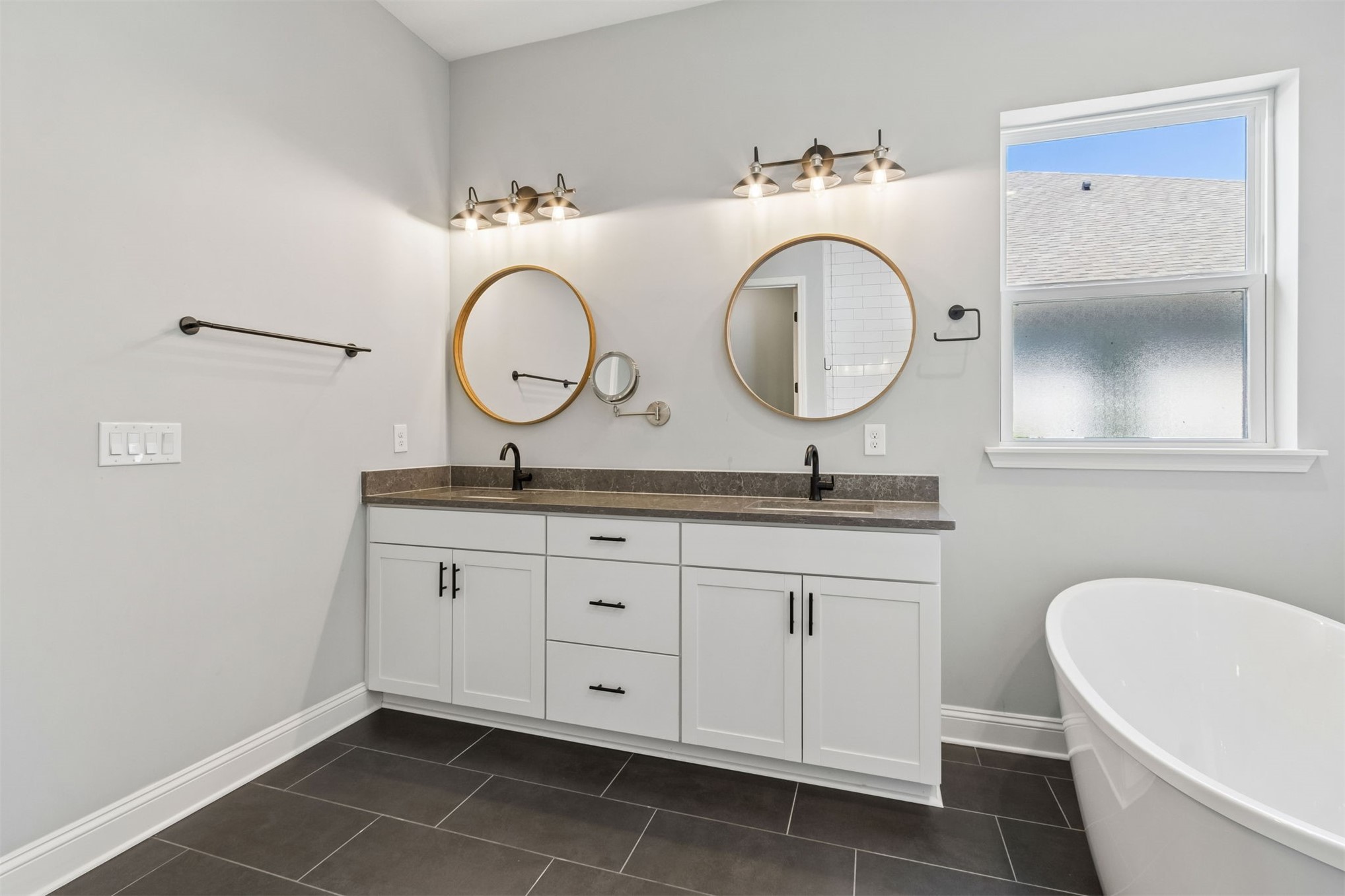 95169 Poplar Way Fernandina Beach, FL 32034 - Photo 9 of 25 a bathroom with a granite countertop double vanity sink and a mirror