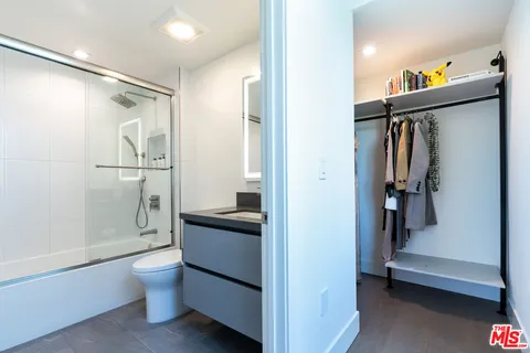 a view of hallway with washer and dryer