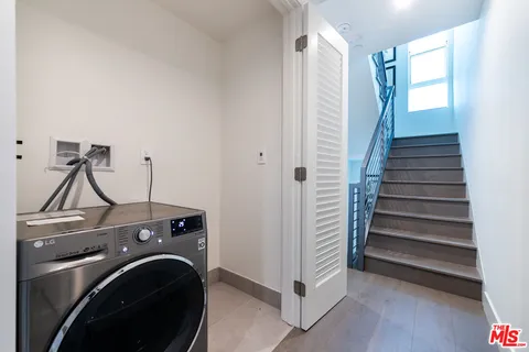 a view of livingroom with furniture and windows