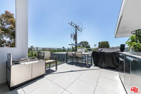 a living room with furniture and windows