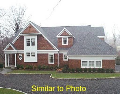 5 Catoonah Street Ridgefield, CT 06877 - Photo 1 of 1 front view of a house with a yard