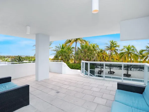 a view of kitchen with furniture and stove