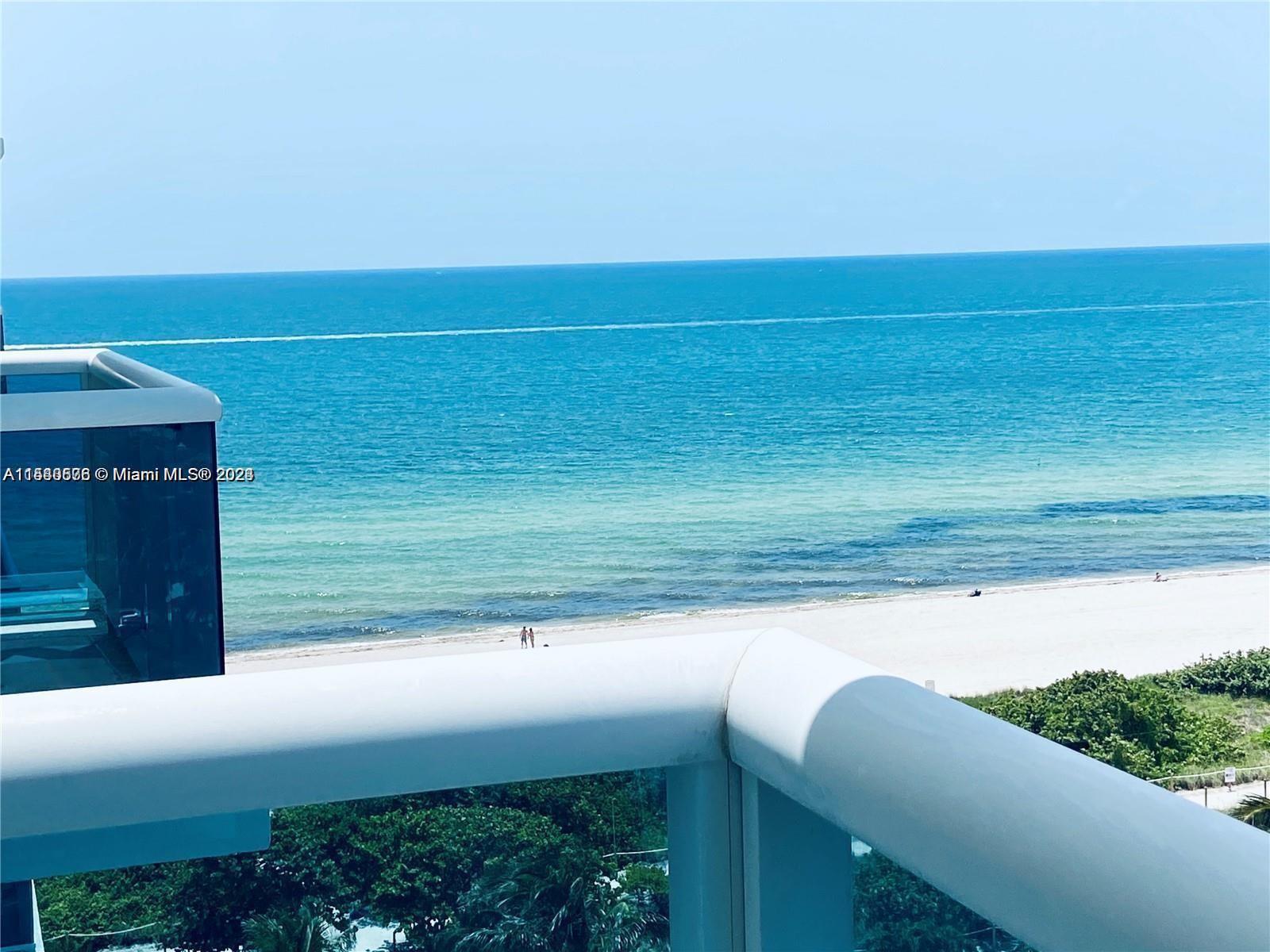 9201 Collins Avenue, Unit 724 Surfside, FL 33154 - Photo 2 of 14 a view of an ocean from a balcony