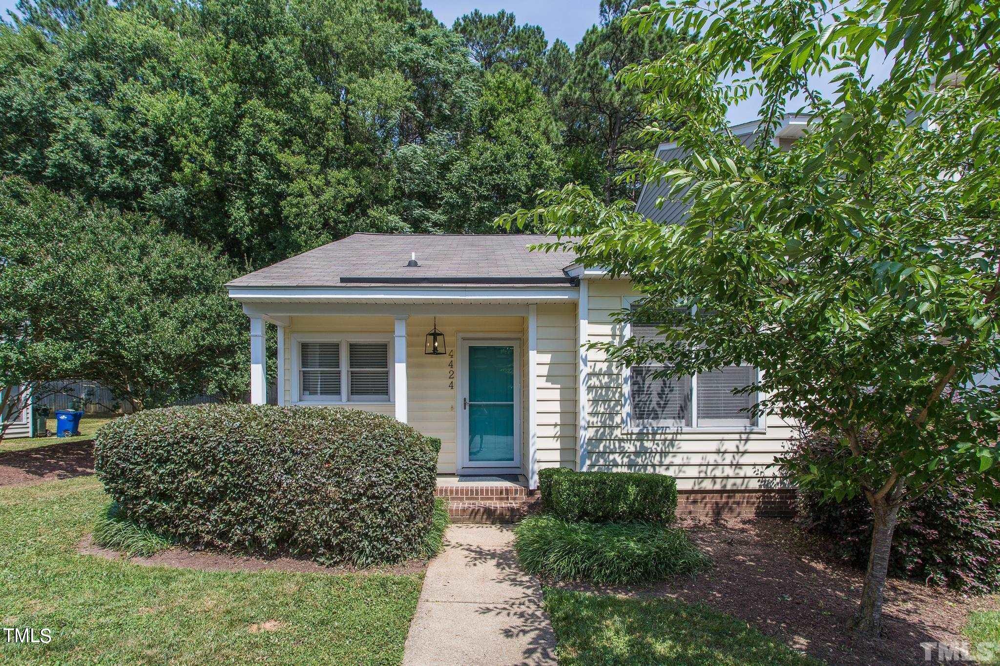 4424 Roller Court Raleigh, NC 27604 - Photo 1 of 19 a front view of a house with a yard