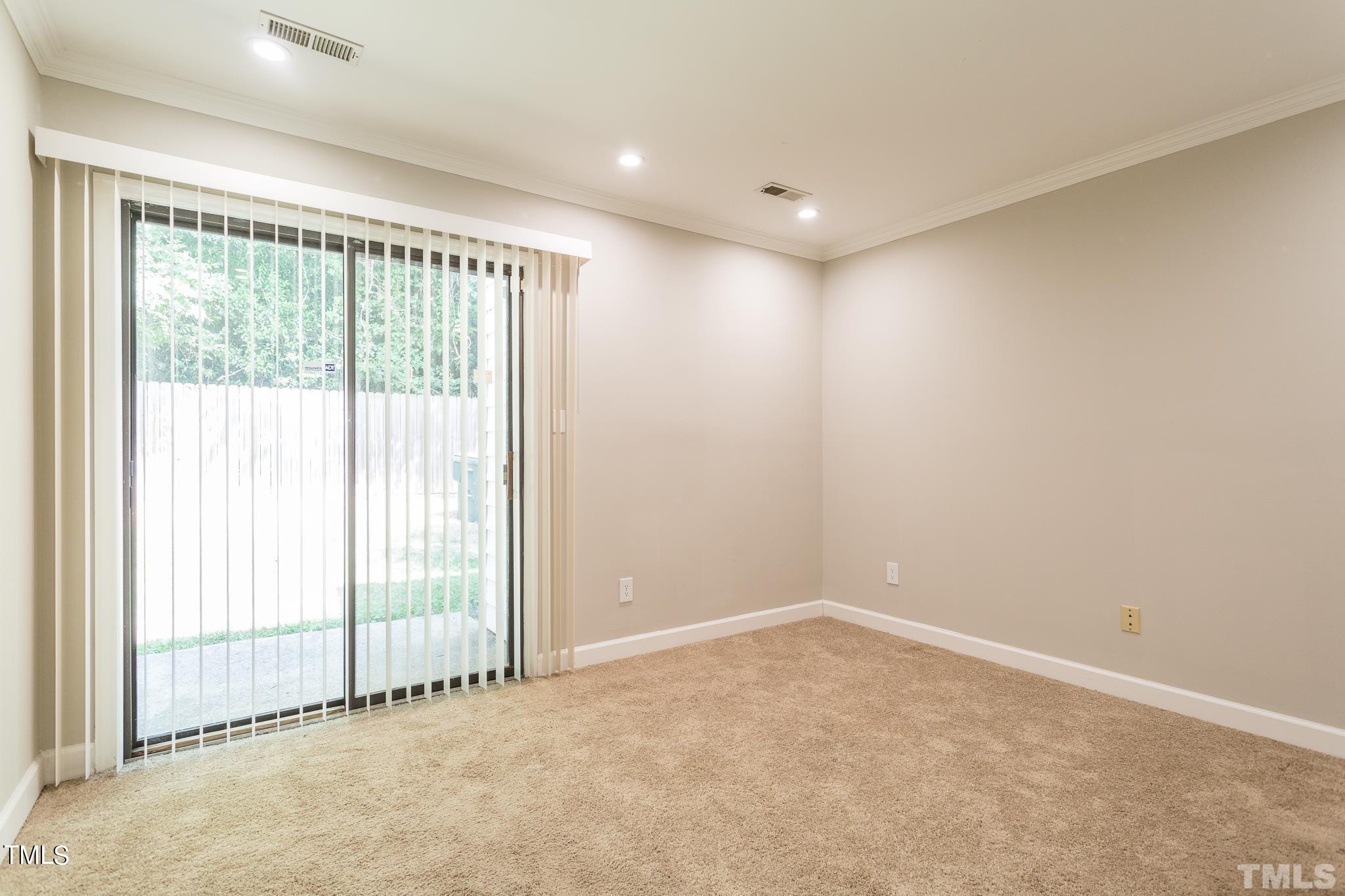 4424 Roller Court Raleigh, NC 27604 - Photo 13 of 19 a view of an empty room with a window