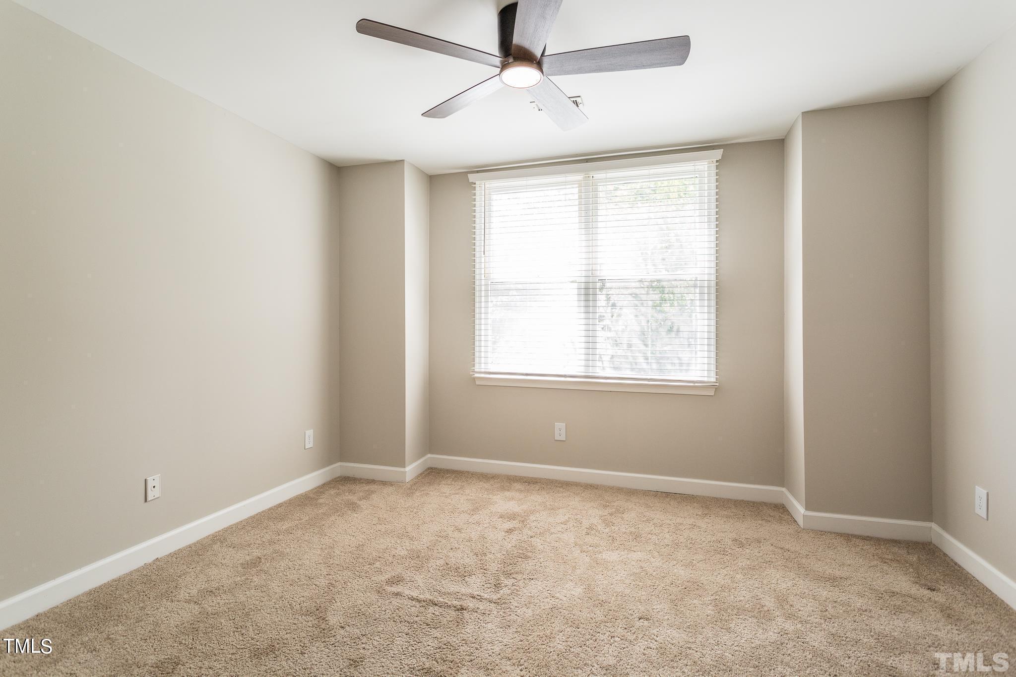 4424 Roller Court Raleigh, NC 27604 - Photo 17 of 19 a view of an empty room with a window
