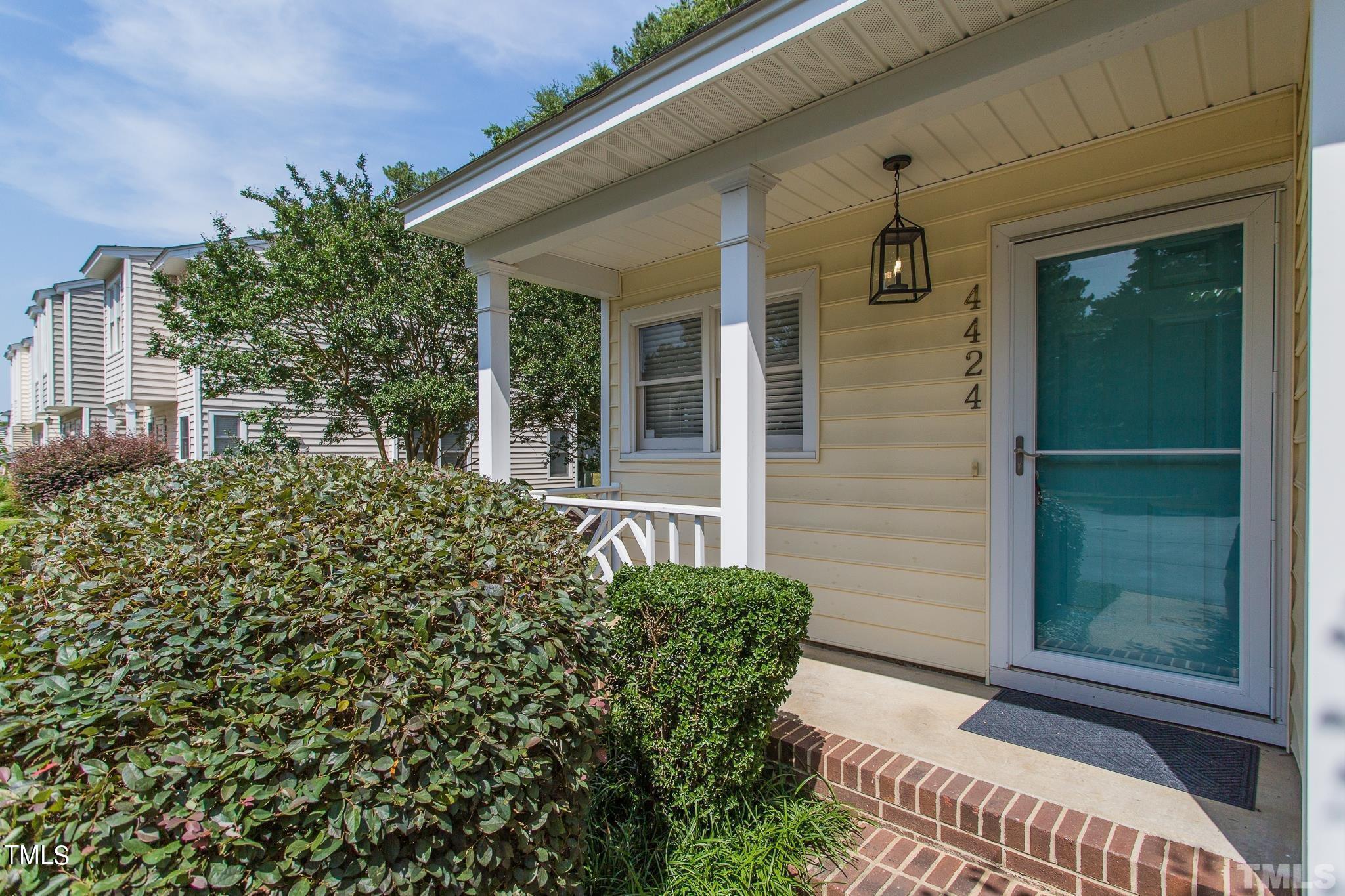 4424 Roller Court Raleigh, NC 27604 - Photo 3 of 19 front view of a house with a yard