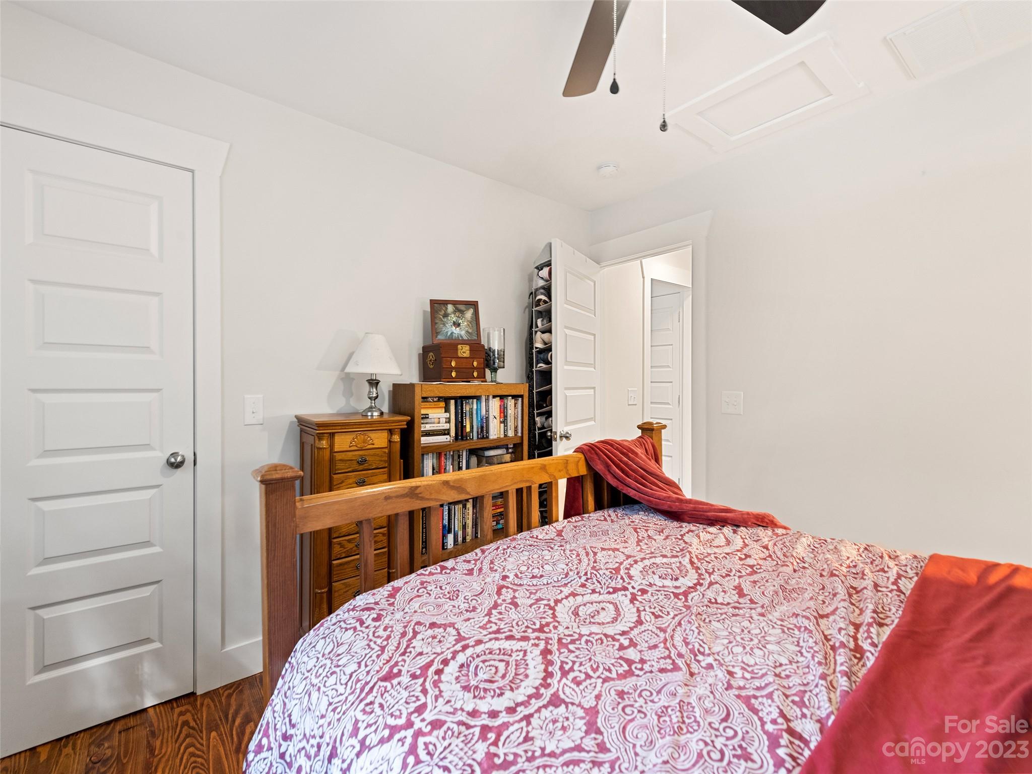 472 County Road Lake Junaluska, NC 28745 - Photo 15 of 26 a bedroom with a bed and wooden floor