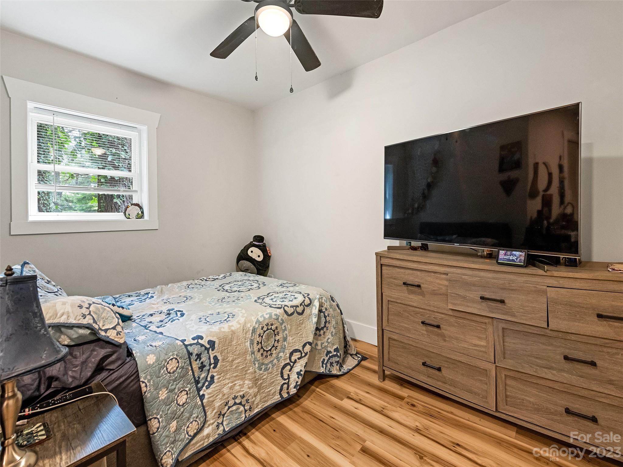 472 County Road Lake Junaluska, NC 28745 - Photo 24 of 26 a bedroom with a bed and flat screen tv