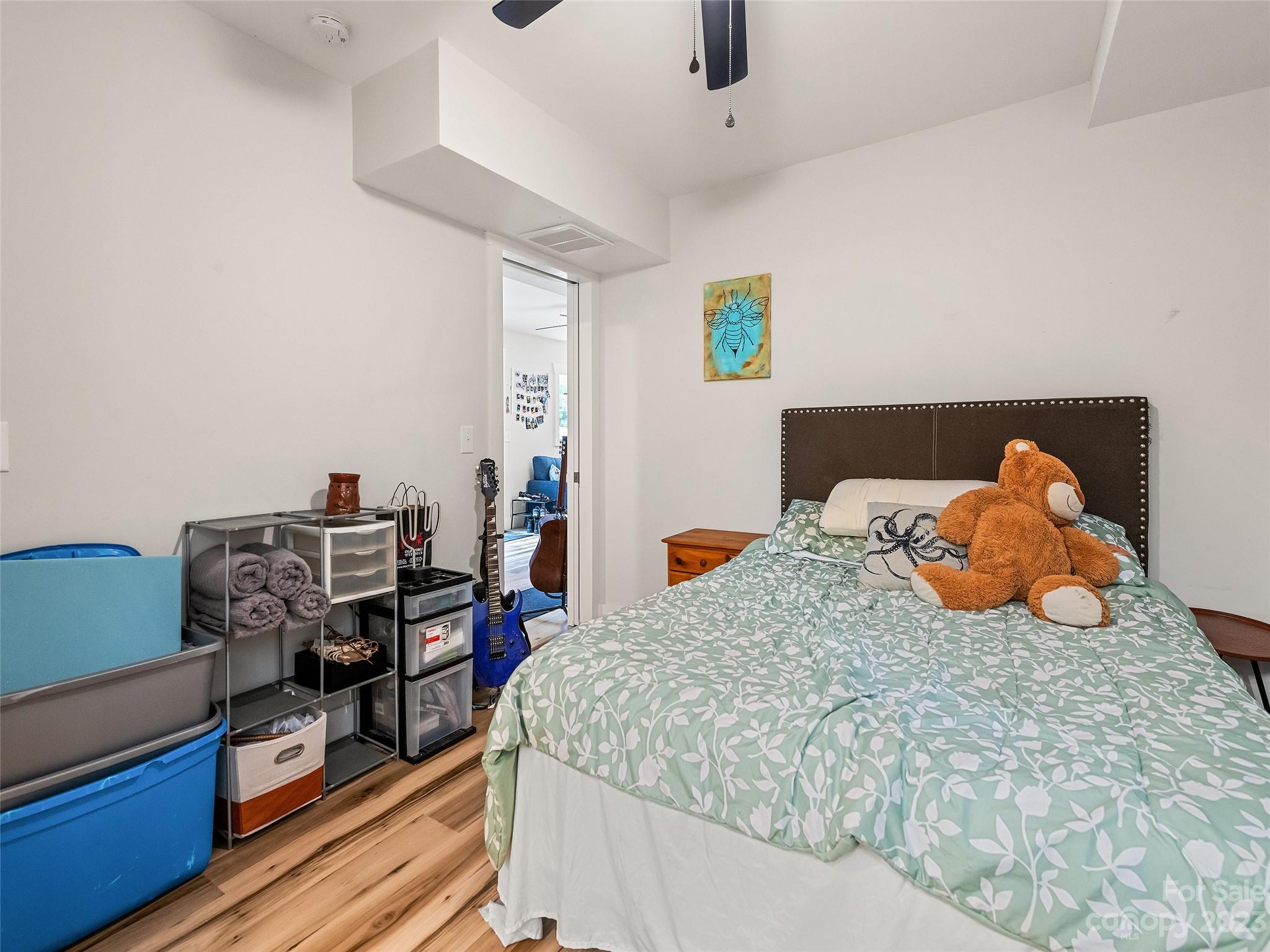 472 County Road Lake Junaluska, NC 28745 - Photo 25 of 26 a bedroom with a bed and wooden floor