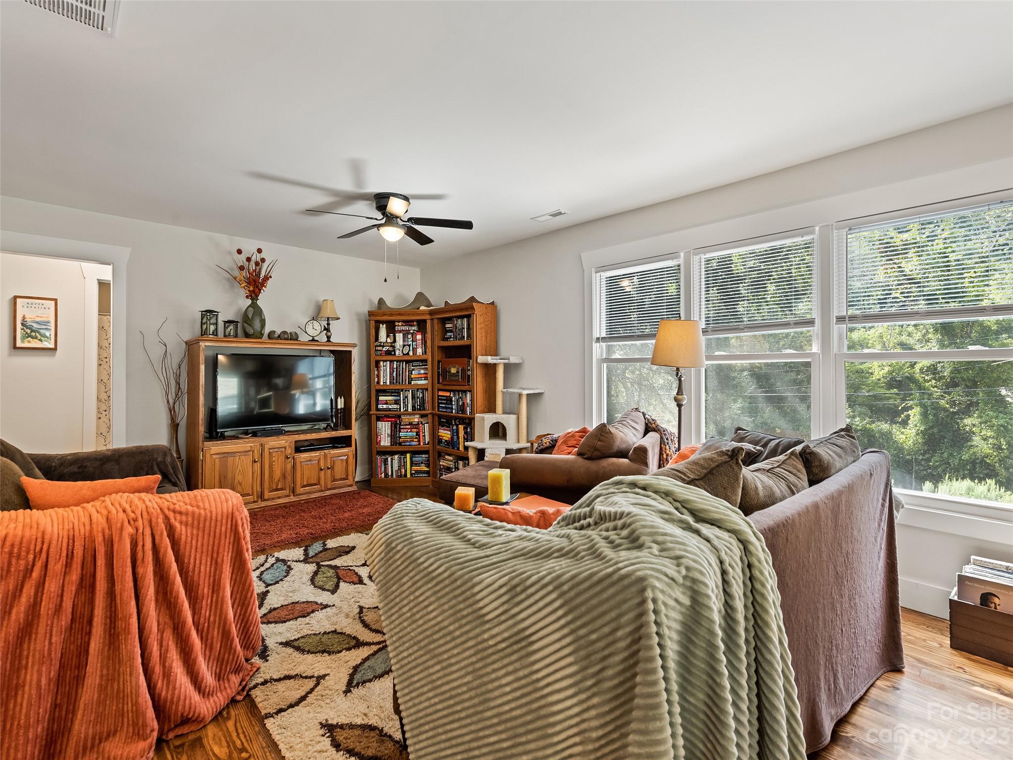 472 County Road Lake Junaluska, NC 28745 - Photo 6 of 26 a bedroom with furniture and a flat screen tv