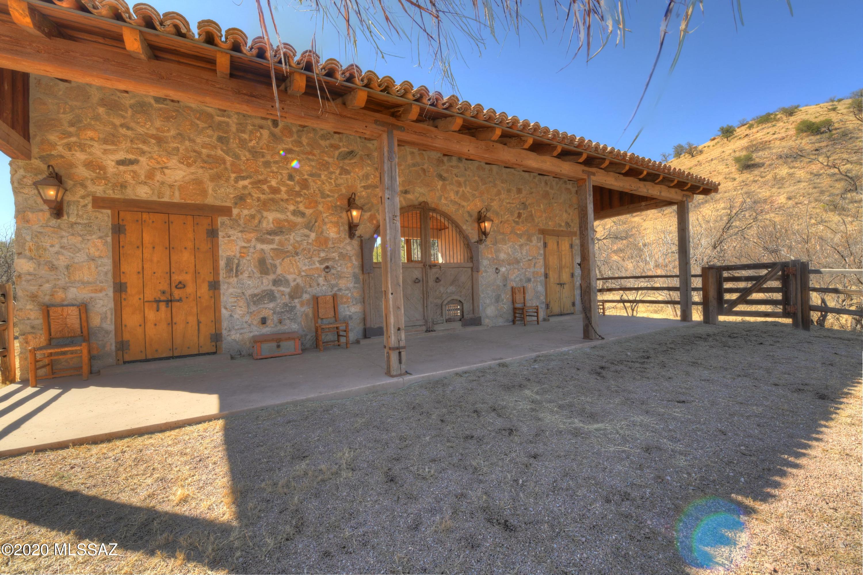360 Harshaw Creek Road Patagonia, AZ 85624 - Photo 41 of 50 a view of a house with a backyard
