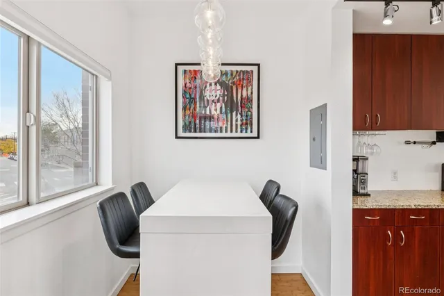 a workspace with furniture and a window