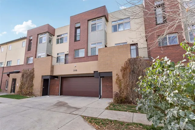 an aerial view of a city with lots of residential buildings
