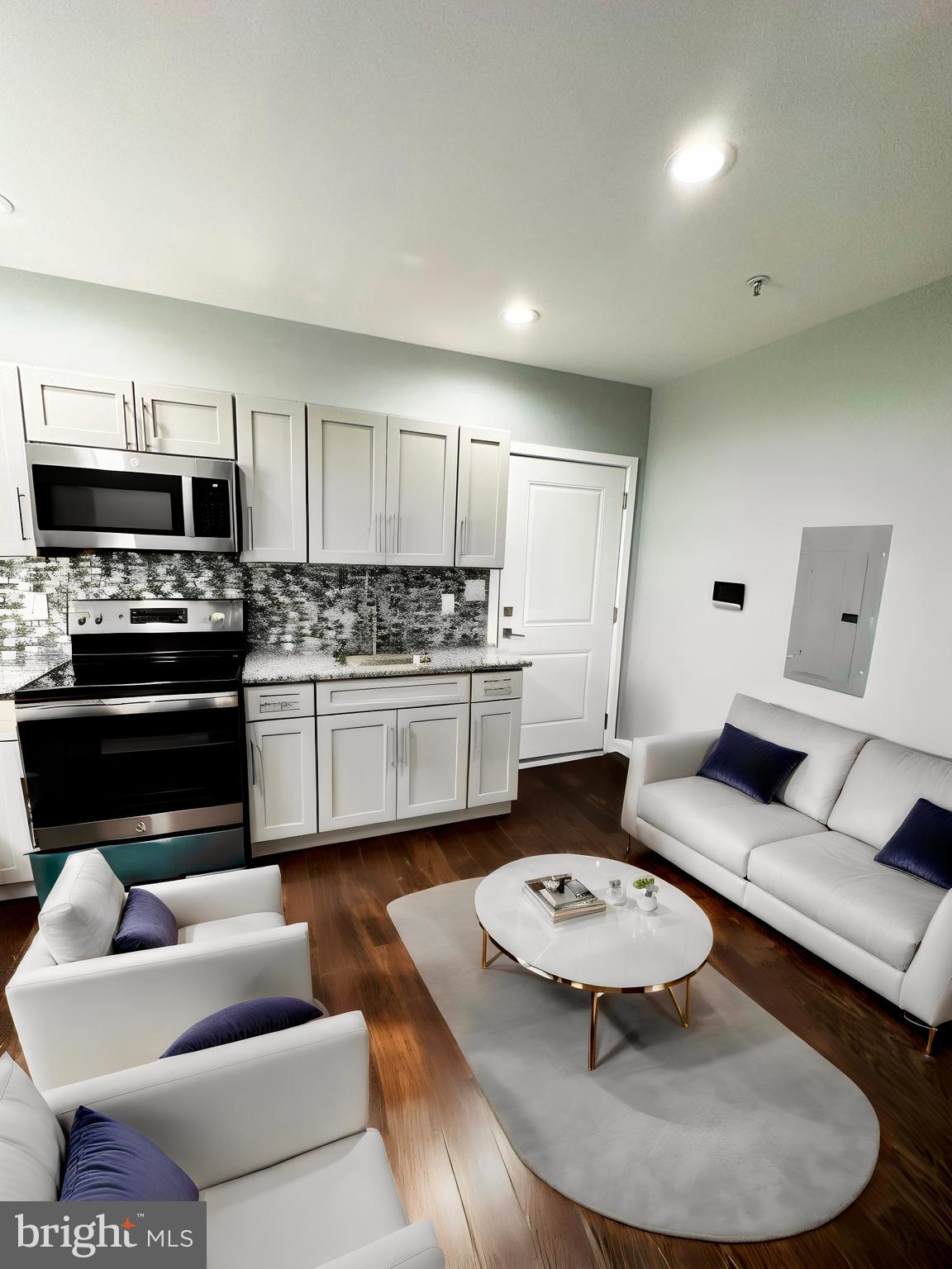 1801 West Venango Street, Unit 3 Philadelphia, PA 19140 - Photo 14 of 22 a kitchen with a stove a sink and a refrigerator