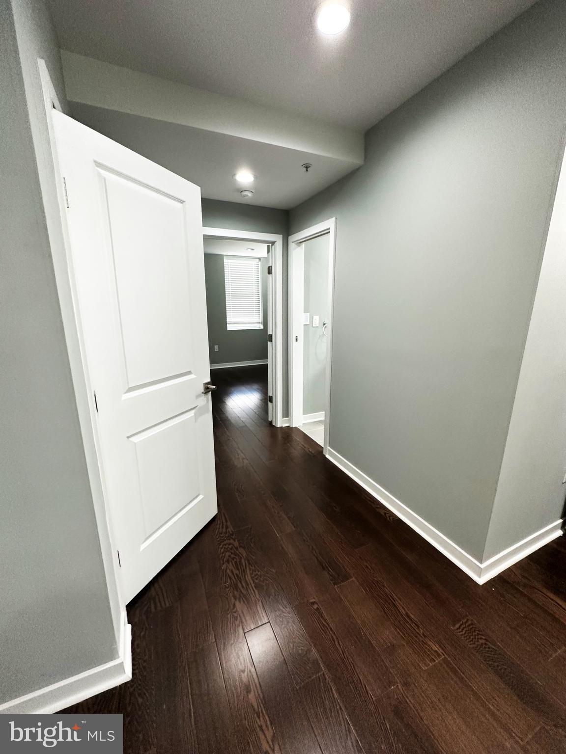 1801 West Venango Street, Unit 3 Philadelphia, PA 19140 - Photo 15 of 22 an empty room with wooden floor and a sink