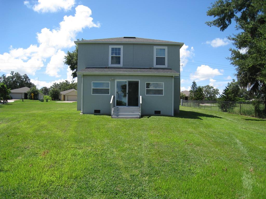 1300 Lucerne Loop Road Northeast Winter Haven, FL 33881 - Photo 39 of 40 Rear of home.