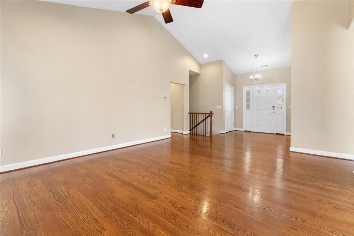 4030 Old Baltimore Road Draper, VA 24324 - Photo 15 of 105 an empty room with wooden floor and windows
