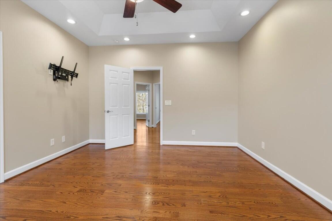 4030 Old Baltimore Road Draper, VA 24324 - Photo 31 of 105 an empty room with wooden floor and natural light
