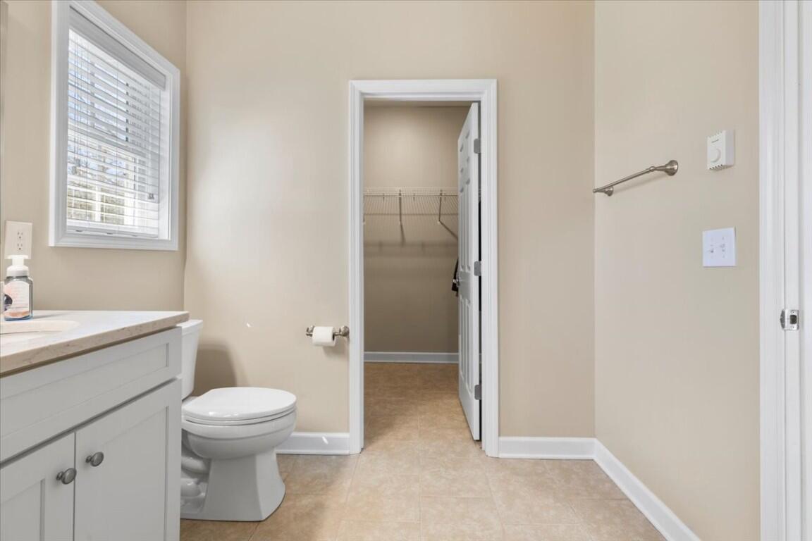 4030 Old Baltimore Road Draper, VA 24324 - Photo 35 of 105 a bathroom with a toilet sink and a shower