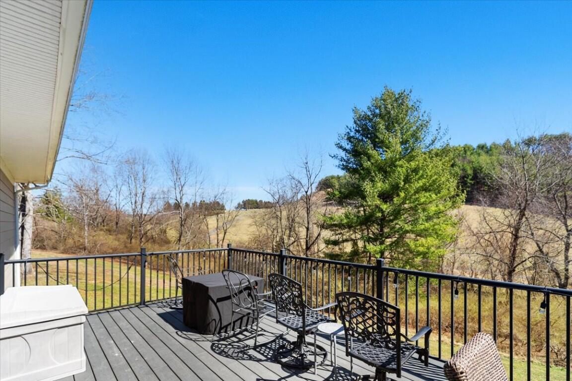 4030 Old Baltimore Road Draper, VA 24324 - Photo 55 of 105 a view of a balcony with two chairs