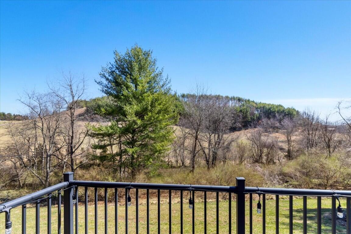 4030 Old Baltimore Road Draper, VA 24324 - Photo 58 of 105 a view of a balcony with wooden fence