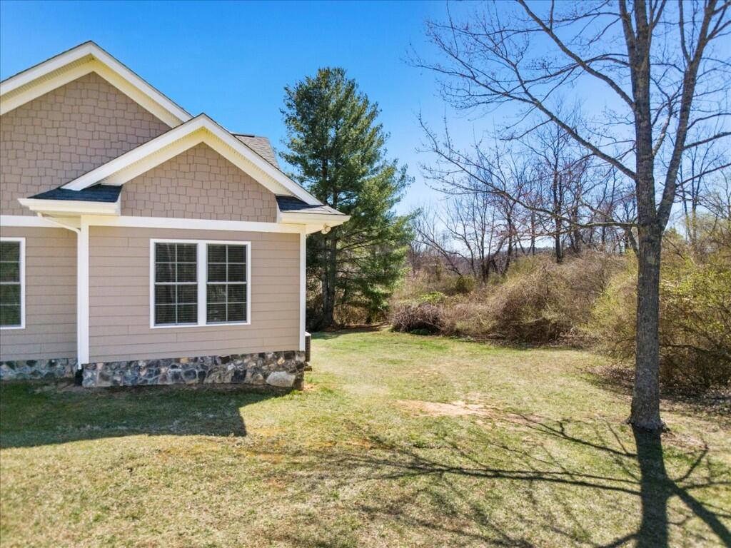 4030 Old Baltimore Road Draper, VA 24324 - Photo 60 of 105 a front view of a house with garden