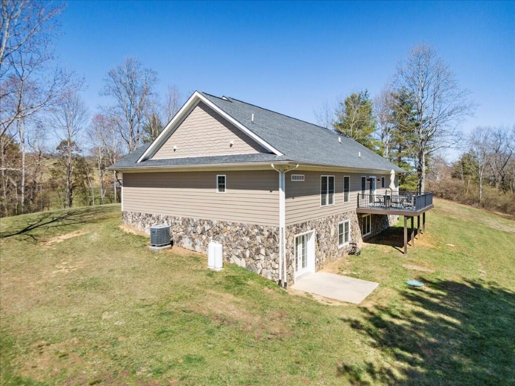 4030 Old Baltimore Road Draper, VA 24324 - Photo 64 of 105 a front view of a house with a yard