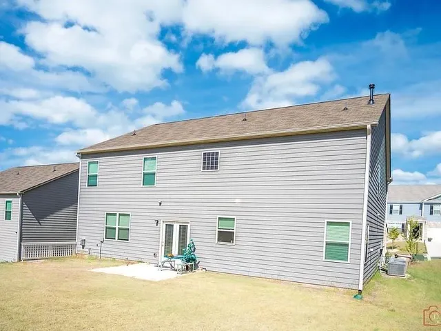 a view of a house with a patio