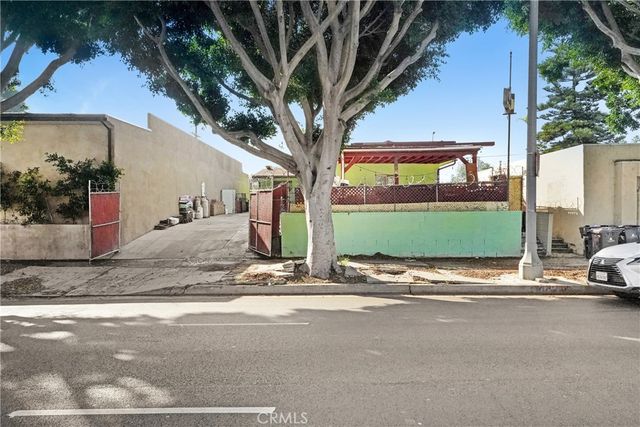 a view of car parked in front of house