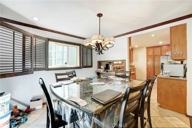 a living room with furniture a fireplace and wooden floor