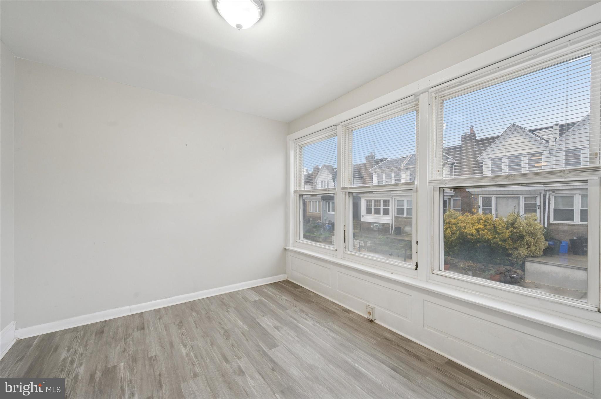 6619 Guyer Avenue, Unit 1 Philadelphia, PA 19142 - Photo 3 of 16 a view of an empty room with a window