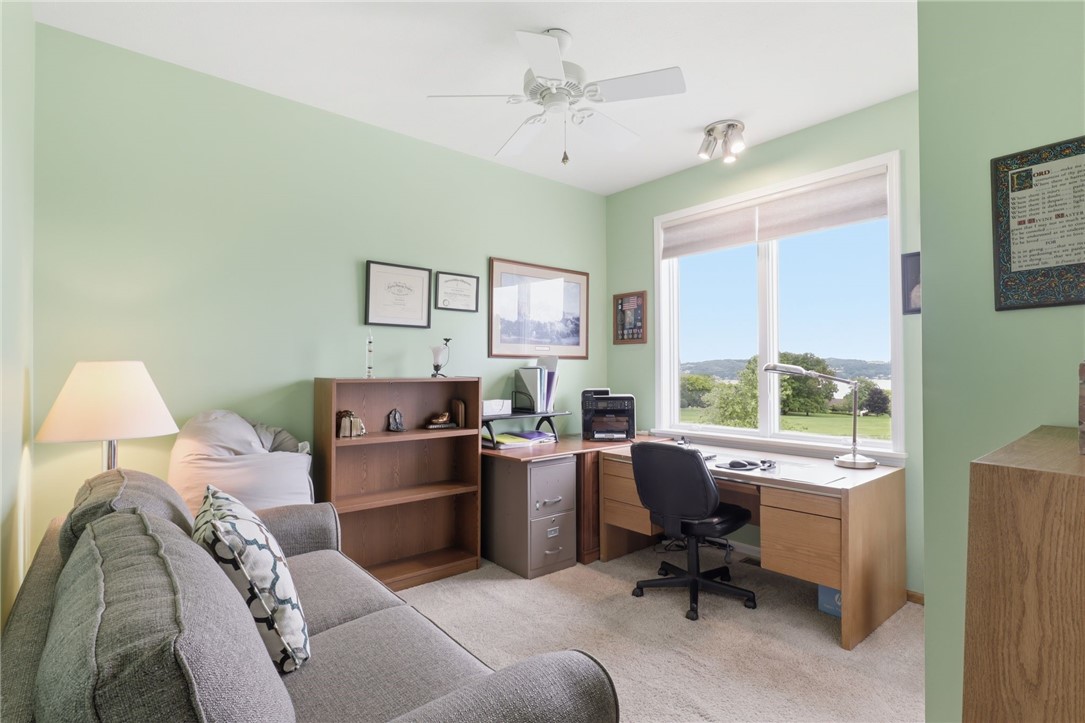 4536 Crystal Ridge Circle Gorham, NY 14424 - Photo 25 of 48 The third bedroom, currently utilized as an office, offers picturesque views of the lake.