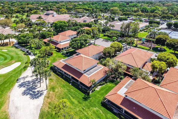 an aerial view of a house with a garden