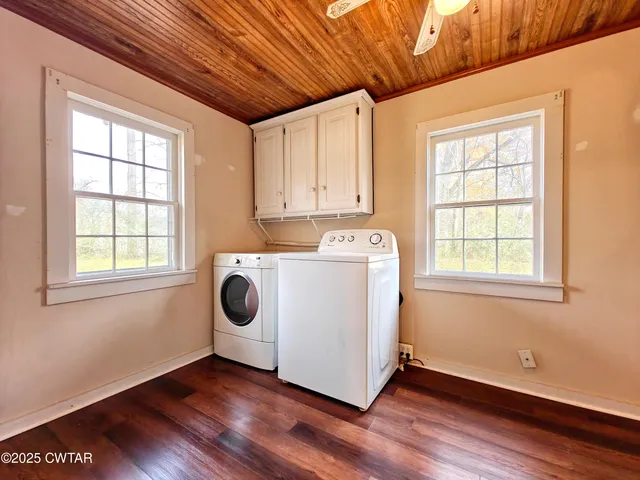a utility room with dryer and washer
