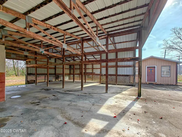 an empty room with furniture