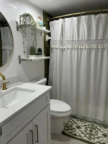 a view of a swimming pool with a lounge chair