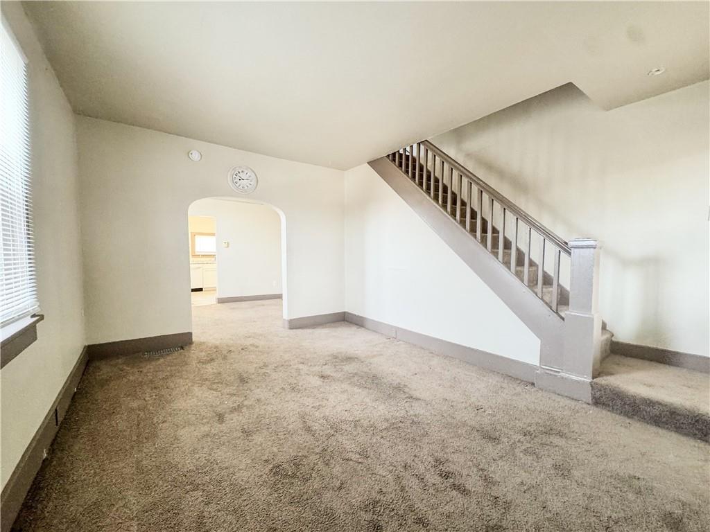 119 Heim Avenue Butler, PA 16001 - Photo 5 of 10 a view of an empty room with stairs