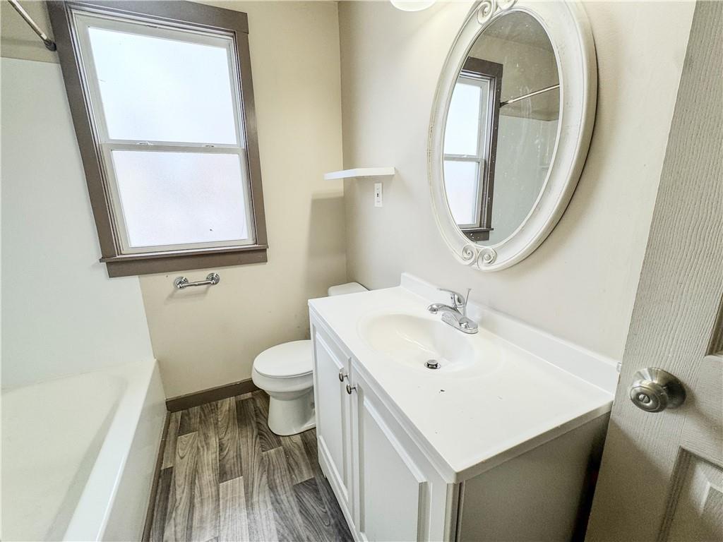 119 Heim Avenue Butler, PA 16001 - Photo 10 of 10 a bathroom with a sink and a mirror