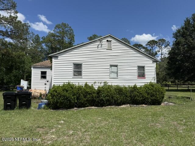5214 Carter Spencer Road Middleburg, FL 32068 - Photo 5 of 50 a front view of a house with a yard