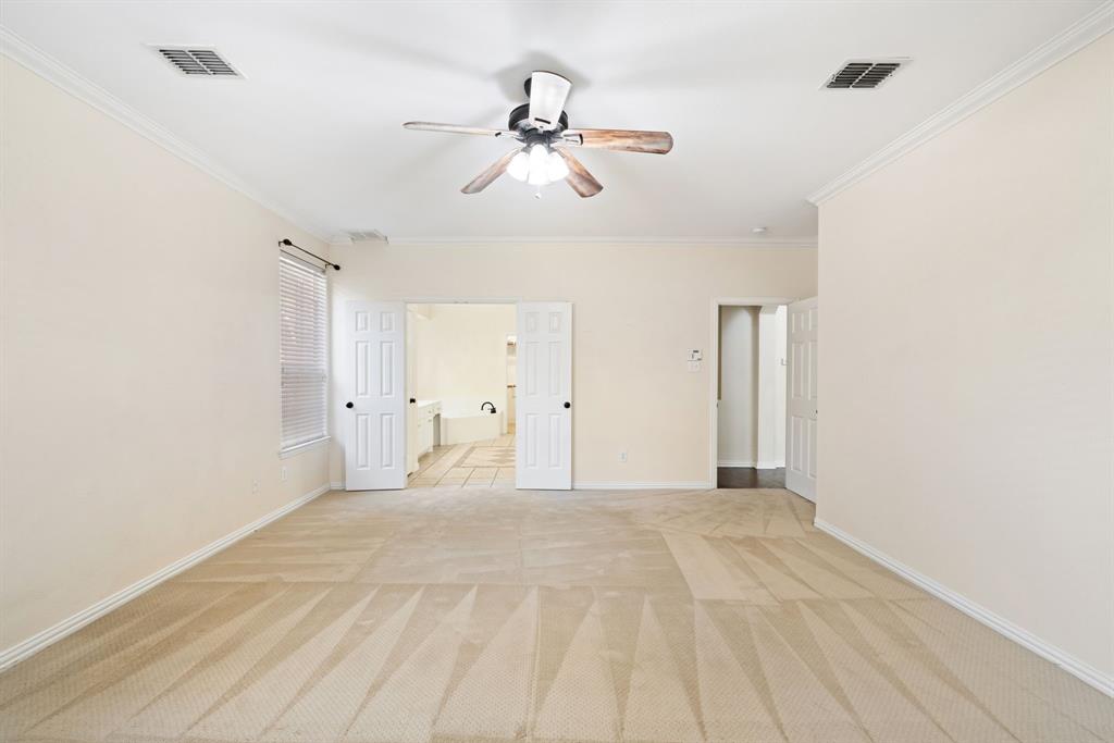 2021 Country Brook Lane Allen, TX 75002 - Photo 20 of 40 a view of a room with a ceiling fan