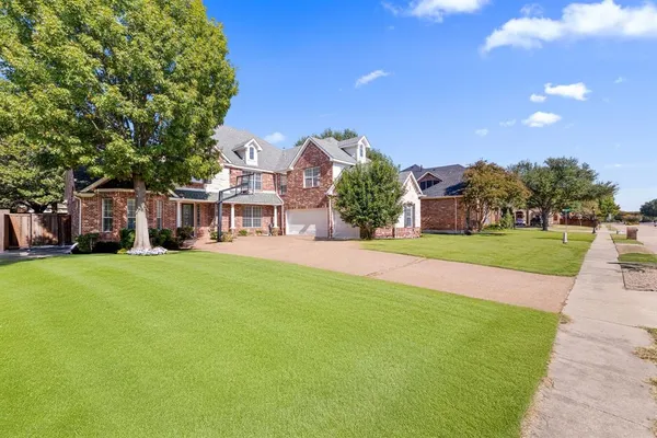 a view of a house with a big yard