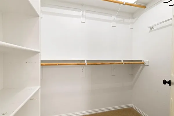 a view of a room with racks on the wall